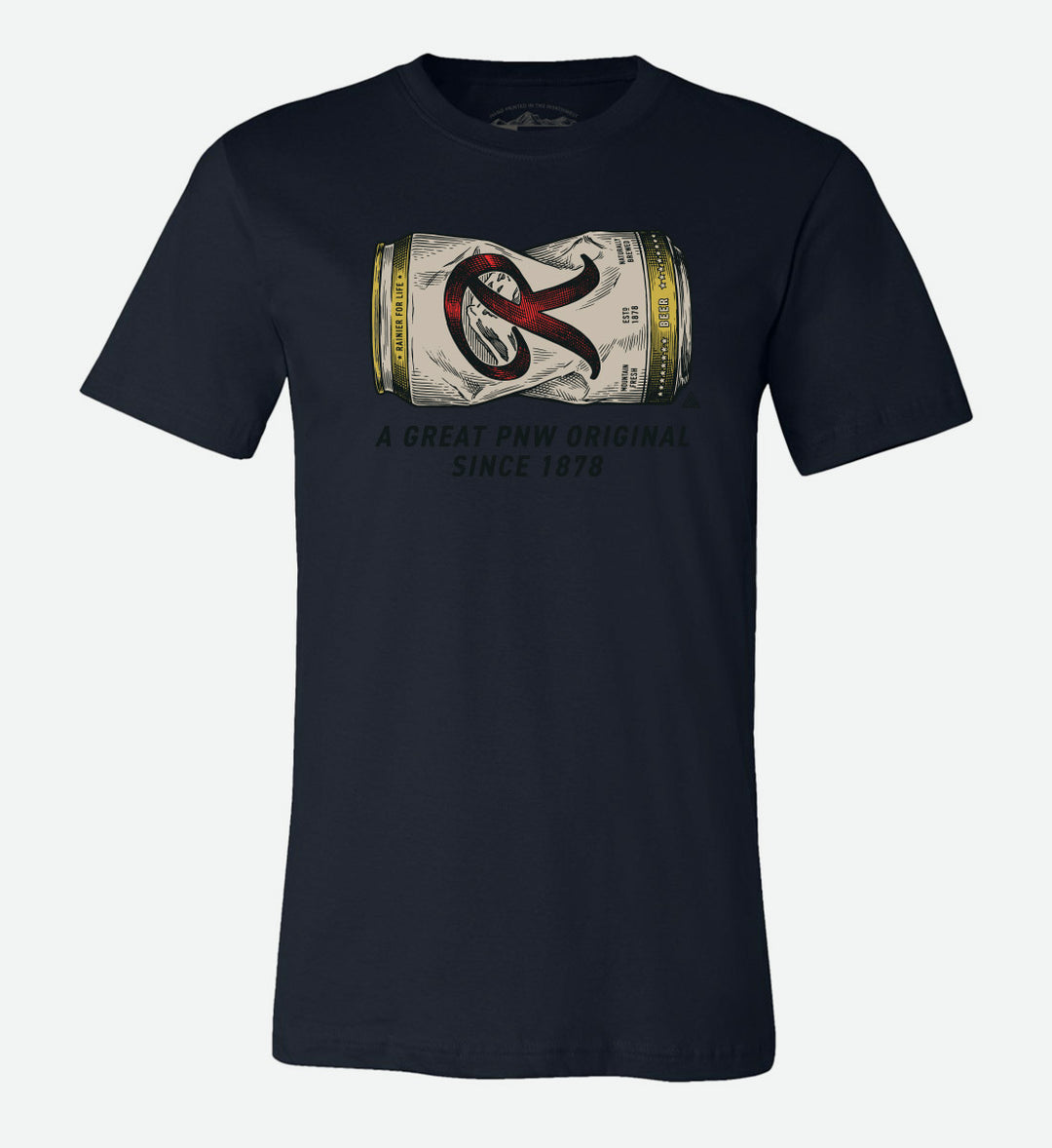 Navy blue t-shirt by The Great PNW featuring a vintage graphic of a crushed Rainier Beer can with the text "A Great PNW Original Since 1878" below it.