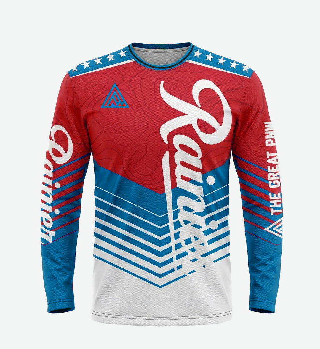 Long-sleeve bike jersey by The Great PNW featuring a bold red, white, and blue chevron and topographical map design. The classic Rainier Beer script logo runs vertically down the front, with stars on the shoulders and "The Great PNW" text printed on the left sleeve.