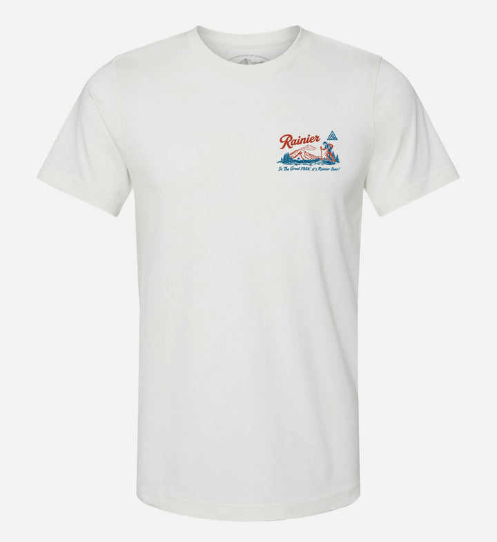 Back of a white t-shirt by The Great PNW featuring a retro red and blue graphic. The design includes an outline of Washington state, a Rainier Beer bottle and can, a deer, outdoor lifestyle scenes, Mt. Rainier, the word "Rainier" in script, and the text "In The Great PNW, it's Rainier Beer!".